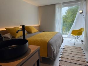 Кровать или кровати в номере Hotel Farsund