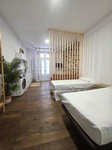 Postel nebo postele na pokoji v ubytování Casa típica Betanzos Casco Histórico