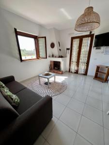 Μια τηλεόραση ή/και κέντρο ψυχαγωγίας στο Holiday Home Pilone +29 φωτογραφίες
