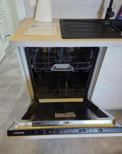 an oven with its door open on a table at Schau ins Land in Rinteln +7 photos