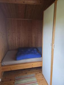 Postel nebo postele na pokoji v ubytování Utsikten + 1 fotografie