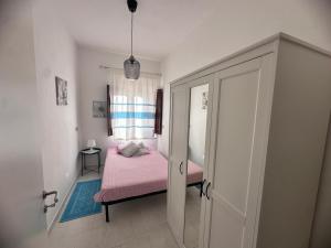 Postel nebo postele na pokoji v ubytování Villa Damiano
