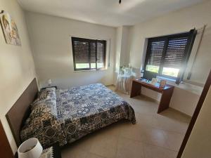 Ένα ή περισσότερα κρεβάτια σε δωμάτιο στο House Ritondale