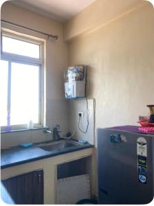 Køkken eller tekøkken på 2BHK spacious stay