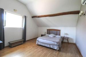 Ένα ή περισσότερα κρεβάτια σε δωμάτιο στο Loft