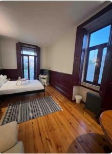 Ένα ή περισσότερα κρεβάτια σε δωμάτιο στο Casa de Ramalde