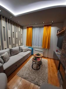 Гостиная зона в Apartmani Leo Titova Vila Zlatibor +65 фотографий