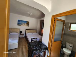Postel nebo postele na pokoji v ubytování Amar Seaside
