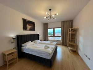 Ένα ή περισσότερα κρεβάτια σε δωμάτιο στο Val Mare +37 φωτογραφίες