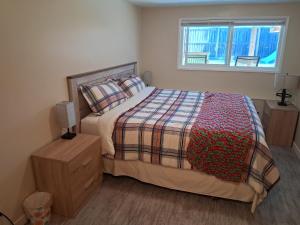Ένα ή περισσότερα κρεβάτια σε δωμάτιο στο Our guest suite