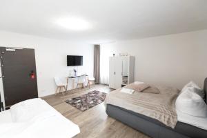 Postel nebo postele na pokoji v ubytování Hotel Dernbach