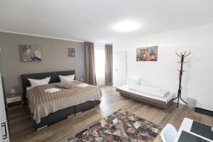 Postel nebo postele na pokoji v ubytování Hotel Dernbach