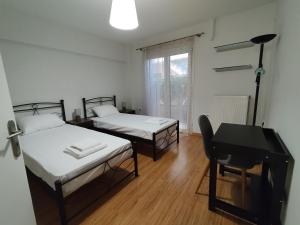 Ένα ή περισσότερα κρεβάτια σε δωμάτιο στο Little Citrus Yard +11 φωτογραφίες