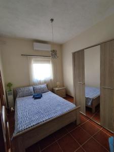Letto o letti in una camera di 3 Bedrooms Apartment