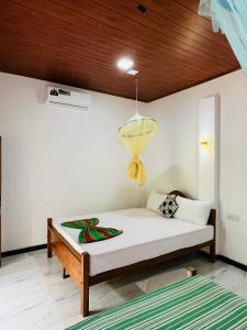 Postel nebo postele na pokoji v ubytování Horizon Resort & Hostel Sigiriya