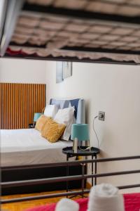 Postel nebo postele na pokoji v ubytování Inside Chiaia Rooms