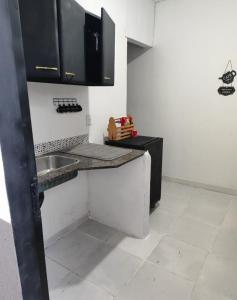 Η κουζίνα ή μικρή κουζίνα στο Loft pousada Brandt 2
