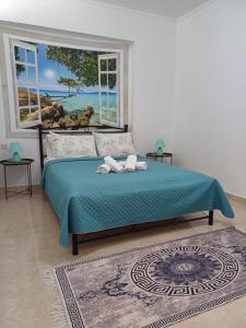 Posteľ alebo postele v izbe v ubytovaní Artemisia Apartment