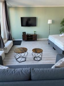 Μια τηλεόραση ή/και κέντρο ψυχαγωγίας στο City Appartment +2 φωτογραφίες