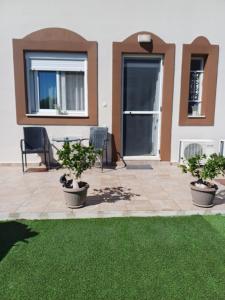 Vonkajšia záhrada v ubytovaní Artemisia Apartment