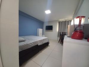 Postel nebo postele na pokoji v ubytování Apart 205 TV WIFI cozinha AC 100 M Cariri Shopp