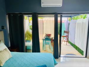 Letto o letti in una camera di Appartements Cayenne Standing