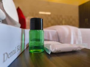Postel nebo postele na pokoji v ubytování Mayura Inn