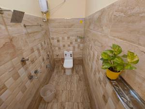 Koupelna v ubytování Mayura Inn + 34 fotografií