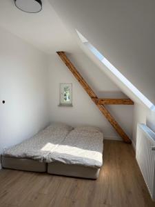 Ένα ή περισσότερα κρεβάτια σε δωμάτιο στο Apartament u Kuby