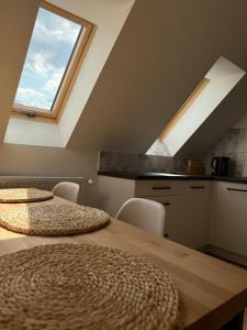 Η κουζίνα ή μικρή κουζίνα στο Apartament u Kuby +6 φωτογραφίες