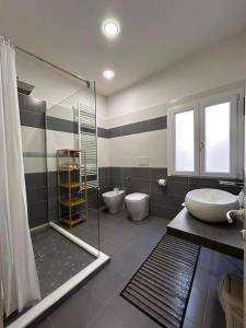 Koupelna v ubytování Vanilla Rooms