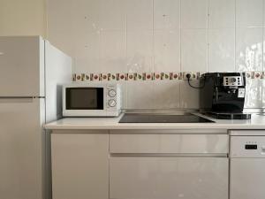 Η κουζίνα ή μικρή κουζίνα στο Apartamento en el centro de Talavera +8 φωτογραφίες