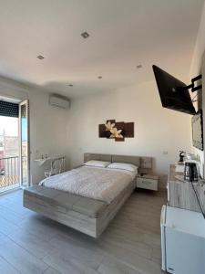 Postel nebo postele na pokoji v ubytování Vanilla Rooms