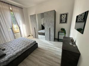 Llit o llits en una habitació de VSuite Linate