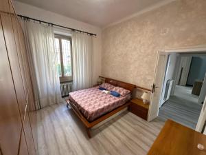 Llit o llits en una habitació de VSuite Linate