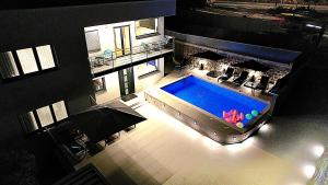 an overhead view of a large swimming pool in a building at Villa Sanys Selce in Selce