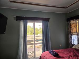 Postel nebo postele na pokoji v ubytování La villa G + 8 fotografií