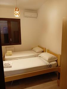 Postel nebo postele na pokoji v ubytování I due Fratelli