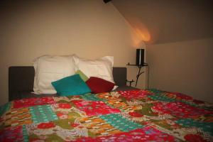 Cama ou camas em um quarto em Lumen7