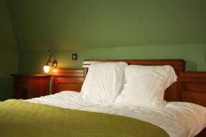 Cama ou camas em um quarto em Lumen7