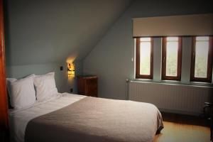 Cama ou camas em um quarto em Lumen7