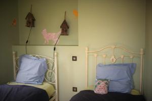 Cama ou camas em um quarto em Lumen7