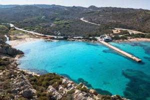 an aerial view of a beach with blue water at Il Fortino Residence - Three-room apartment La Maddalena in La Maddalena