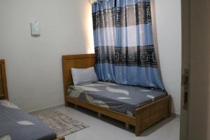 Voodi või voodid majutusasutuse Votre coin cosy au centre d'Agadir toas