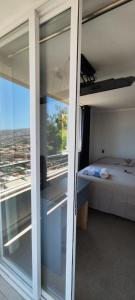 Ένα ή περισσότερα κρεβάτια σε δωμάτιο στο Exclusive 5P Family Apartment with ocean views