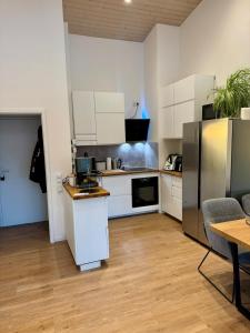 Η κουζίνα ή μικρή κουζίνα στο Stylish 3-room apartment, centrally located +3 φωτογραφίες