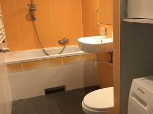 Koupelna v ubytování Adamant Apartament