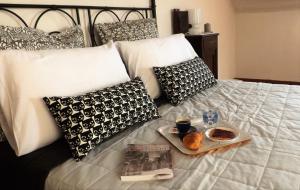 A bed or beds in a room at Domus Tua