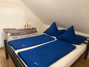 Postel nebo postele na pokoji v ubytování Ferienwohnung für Gruppen oder Familien