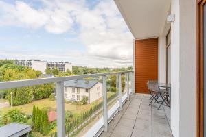 Un balcon sau o terasă la Apartament Przy Fali Sianożęty